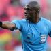 Côte d’Ivoire : Doué Noumandiez remplace Bonaventure Kalou à la tête des arbitres de la FIF 8 Doué Noumandiez, ancien arbitre international ivoirien, en train d’arbitrer un match de football.